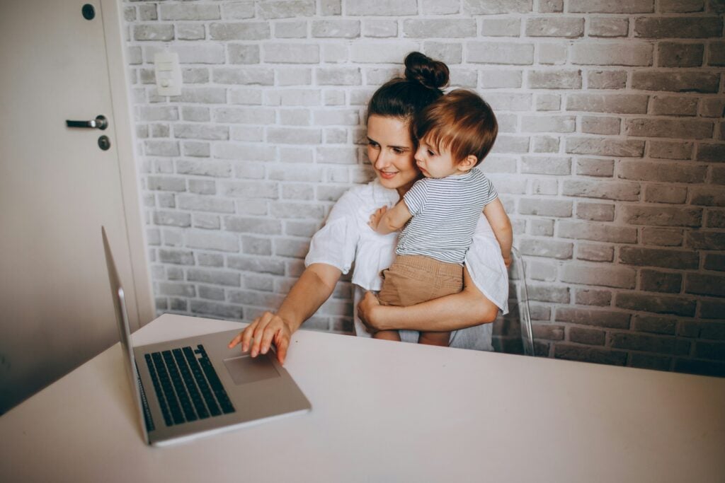 Work From Home 2026 remote job workspace with laptop and desk